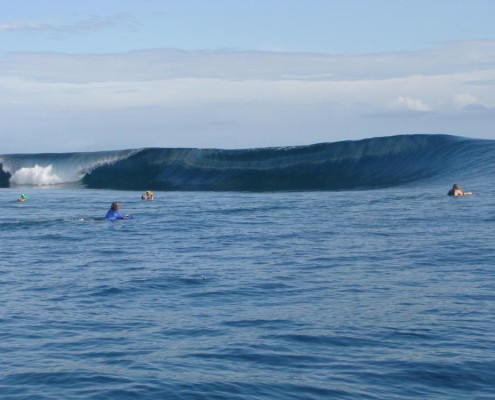 Surfing Fiji Pipe or Teahupoo